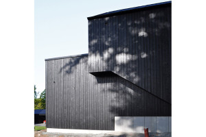 Bild på husfasad byggd av PMB Sverige.